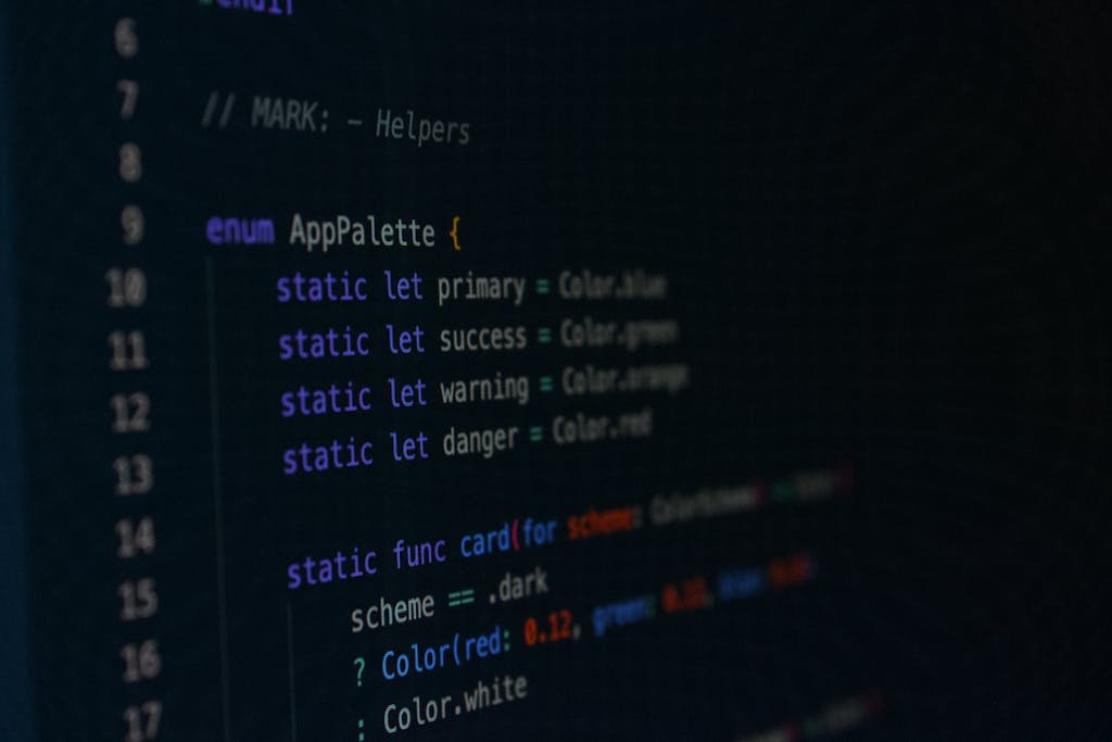 Macro photography of color palette code in a programming environment.